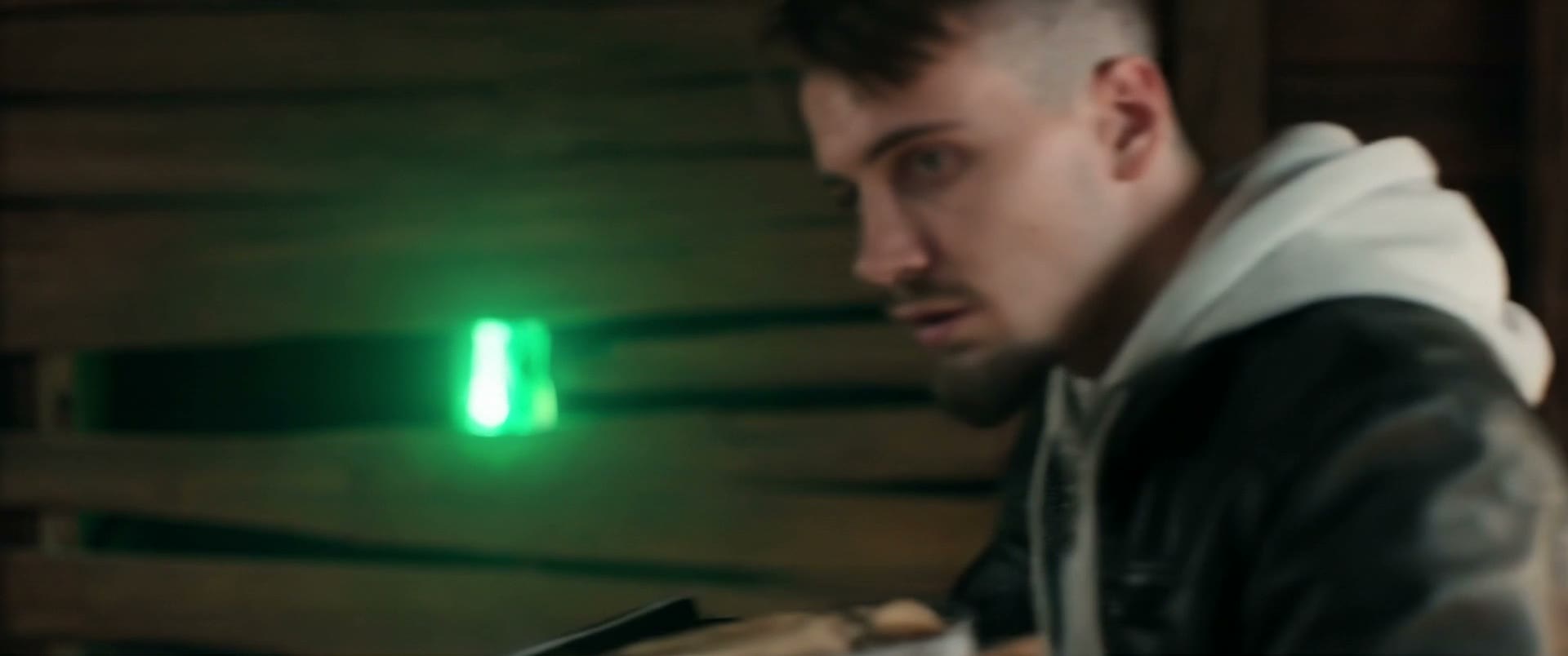 Darb discovers a green light in the attic, from the AXIOMORT trailer